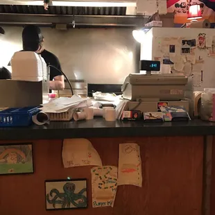 Cooking right where ya pay , very small place but good burgers