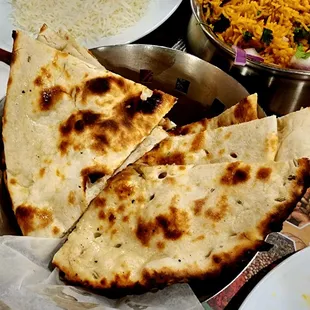 Butter and Garlic Naan. $4.50 each.