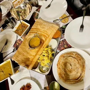 Masala Dosa ($13.95), Malabar parotta($11.90)
