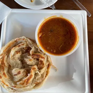 Malabar porotta and chicken curry
