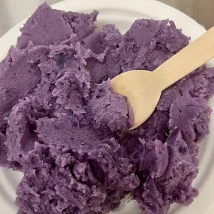 a bowl of purple mashed potatoes