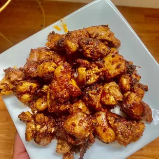 a plate of chicken wings