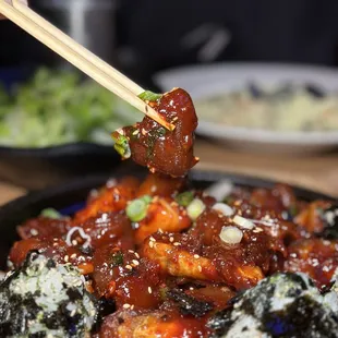 Braised pork feet (jokbal) stir fried in spicy sauce