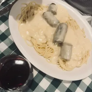 Husband asked for Alfredo on his spaghetti and Italian sausage instead of red sauce.  He ate dang near every bit!!