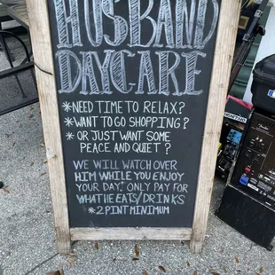 a sign for husband's day care