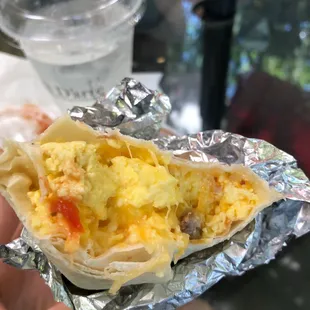 Breakfast Burrito ($7.95 as of may 2021). All sausage was on the bottom, but overall good