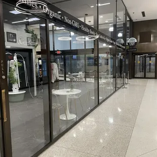 Front of store in hall inside business building
