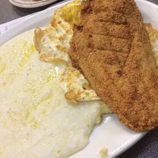 Catfish, fried eggs, grits, toast and a tea 7.99 man it&apos;s slamming!