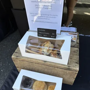 two boxes of pastries on a table
