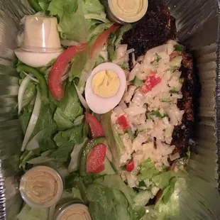 Grilled fish with salad