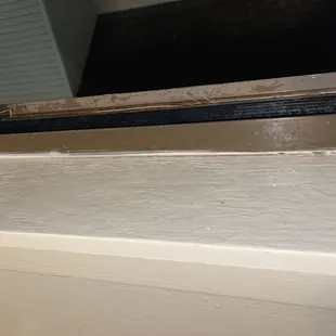 No screen on window with rain coming in