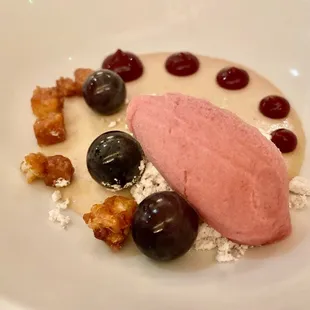 a white plate with a dessert on it