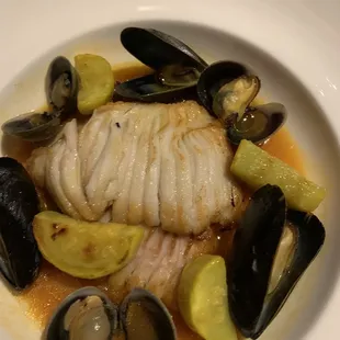 Skate wing with mussels and clams