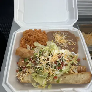 Chicken flautas rice and beans