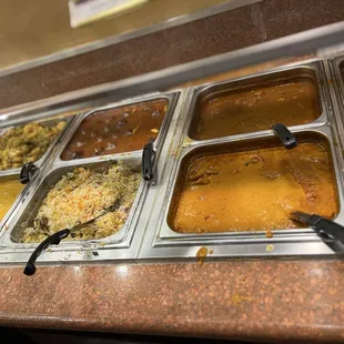 Chicken Tikka Masala, goat curry, and dark meat chicken curry