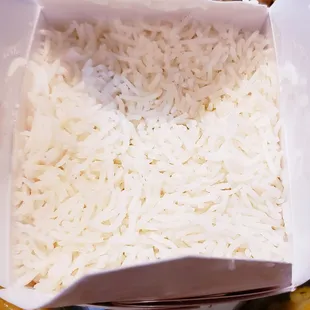 Large side of rice with curry.