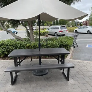 This is the only table available outside, they set it up when they don't have enough tables inside.