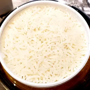 Side of rice with curry.