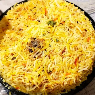 Goat Biriyani. $16.95. Generous portion. Tender meat.