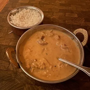 Chicken Tikka Masala in lovely copper dish.