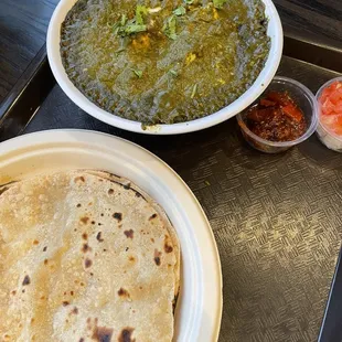 two plates of food on a tray