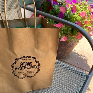 a paper bag on a chair
