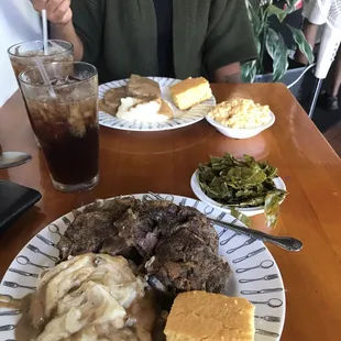 Neck bones, Mashed potatoes w/gravy, greens and corn bread Meatloaf and mashed potatoes w/gravy and Mac n cheese.  Ice Tea