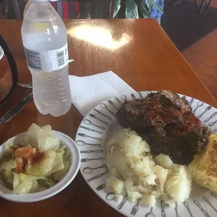Neckbones, buttered potatoes, cornbread and cabbage.  Delicious!!!!