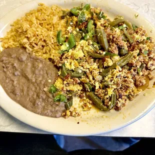 Cactus, Chorizo, and eggs with rice, beans, and tortillas