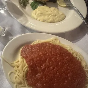 Side of pasta.  Crab cake in background