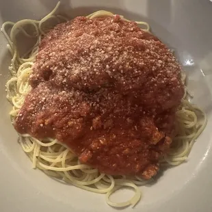 Braciole atop pasta