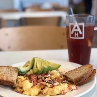 California omelette with eggs, bacon, avocado, tomato and cream cheese with toast--really delicious!