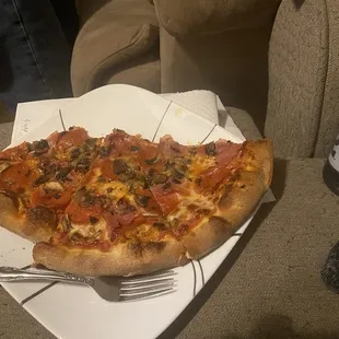The pieces of pizza that escaped the box ....