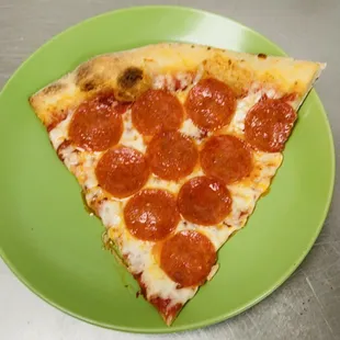 a slice of pepperoni pizza