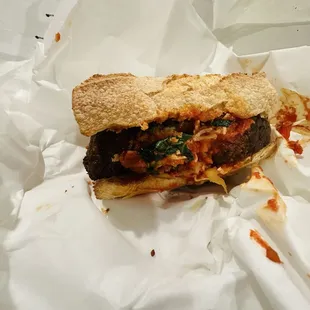 Fuggedaboutit. Meatball sandwich. Husband says it was good.