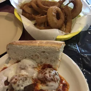 Meatball sub and onion rings.