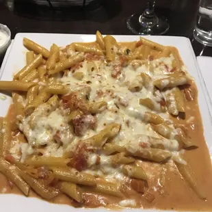 Penne ala vodka w added baked cheese