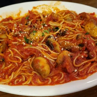 Angel hair in marinara with mushrooms.