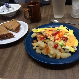 Western Omelette w/ home fries &amp; wheat toast.