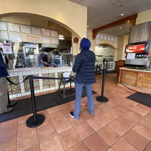 a woman in a blue jacket