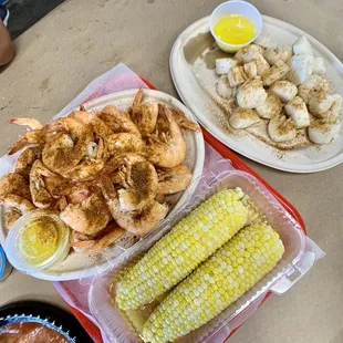 2lb Steamed shrimp with old bay, 2 corn on the cob, 1lb scallop with old bay.