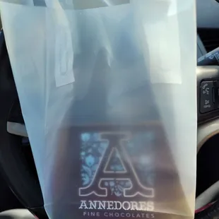 Bag of boxed chocolate