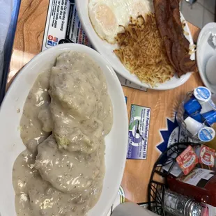 Biscuits, gravy, hash browns, over easy eggs and bacon.