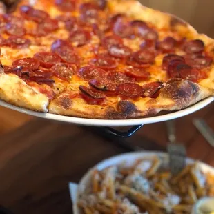 Pepperoni pizza and Parm Fries