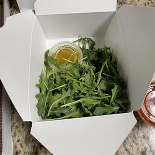 Arugula on the side -- takeout
