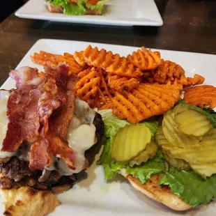 The mushroom burger with added bacon and sweet potato fries.