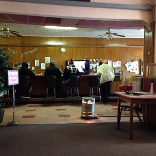 people sitting at the bar