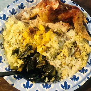 fried chicken wing, turkey wing, collard greens, dressing, Mac and cheese, rice and gravy and potato salad.