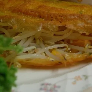 Their Crepe filled with shrimp, pork, bean sprouts and many more eaten with sweet fish sauce. Yummy!