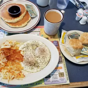 Build Your Own Breakfast...Two eggs, hash browns, and country biscuits. My wife's pancakes are in the background.